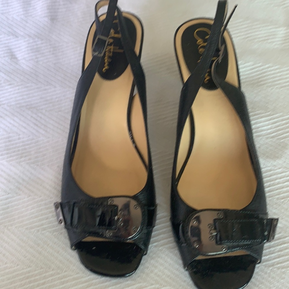 Cole Haan black ankle strap with faux buckle front